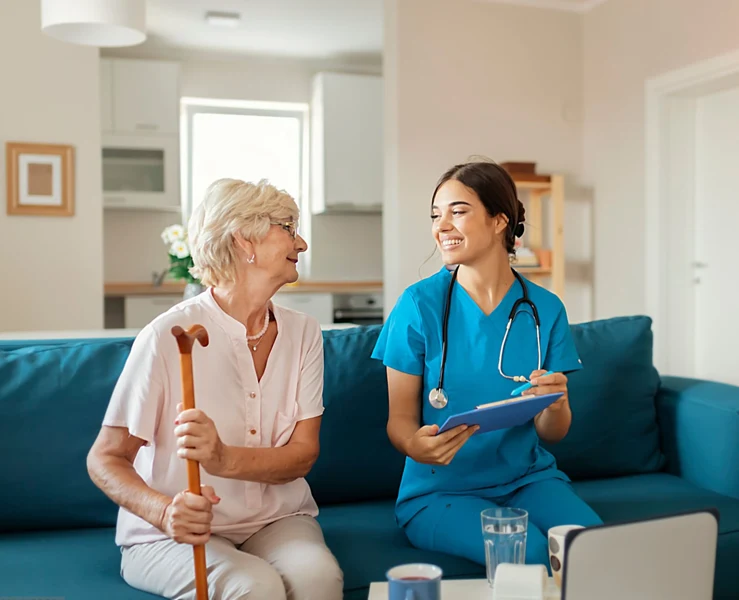 Nurse Checking Senior Woman at Home